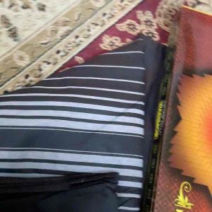 Kain pelikat wadimor hitam berjalur