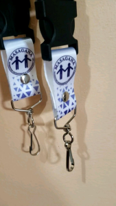CUSTOMIZED REVERSIBLE ID LACE / LANYARD | SHINY 1 INCH | FREE LAYOUT | NO MINIMUM ORDER White lanyards with red and blue chevron patterns and black clips. Brand name "NOUVE A" and "Pagani Collection" printed on them.