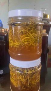 Hoa đu đủ được  ngâm với mật ong ruồi (700g)