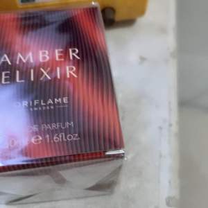 PARFUM AWET TAHAN LAMA AMBER ELIXIR EAU DE PARFUM ORIFLAMEE