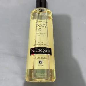 Neutrogena Body Oil light sesame formula 250ml April 2027 expiration