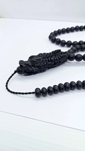 Tasbih kayu kelor hitam kepala ukir naga