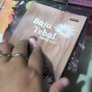 Novel BAJU TEBAL oleh Rizaldi Yusuf