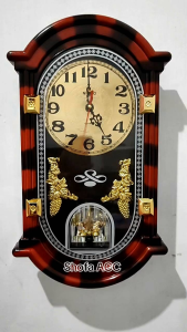 Jam Dinding Esa Musik Melodi Bell NK 139 dengan Mainan Berputar Otomatis