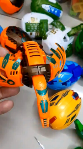 Bakugan toy transformation dinosaur green and orange figure with wings
