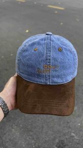 Mũ lưỡi trai denim da lộn .màu xanh dương và nâu với dòng chữ "Dont Quit"