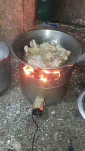 Steel Charcoal stove with electric ignition portable durable stackable suitable for outdoor cooking.