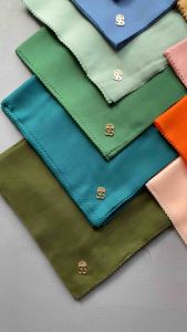 Hijab Segiempat Polos Logo SS SHELLA SAUKIA + Pouch Bahan Paris Lasercut Premium Nyaman dipakai