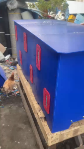 Blue&red plastic triple folding cage for mating. Dimensions: height 23 inches width 22 inches length 48 inches. Features red ventilation panels. Suitable for animal housing in industrial settings.