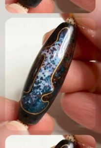 Tibetan Dzi Beads Xiang Xiong Cinnabar Guanyin Dzi Beads 藏传措金象雄朱砂观音天珠 37.6x12.9mm