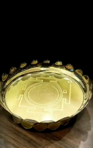 Gold decorative plate with lotus edge and geometric design