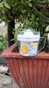 Dụng cụ vắt cam trong suốt Việt Nhật có lưới lọc nắp đậy kèm ca đong định mức