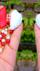 Bros merah pitih motif pita panjang 9cm