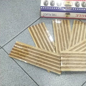 KARET TAMBAL TUBELES MERK EAGLE 1 KOTAK ISI 6 STRIP 30 BATANG