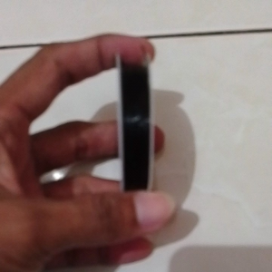 senar elastis bulat warna hitam per Rol