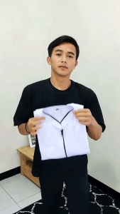 Baju Koko Resleting Lengan Panjang Model Terbaru di Tahun Ini