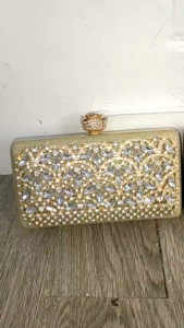 JT002 - Dompet Pesta Wanita Elegan Import (Tali Rantai)\\n\\nDompet pesta wanita elegan import (tali rantai) adalah salah satu aksesori yang bisa menambahkan sentuhan keanggunan dan gaya pada penampilan Anda saat menghadiri acara formal atau pesta. Dalam artikel ini, kita akan membahas keunggulan, cara memilih, rekomendasi, serta cara merawat dompet pesta berkualitas tinggi ini.\\n\\n Dompet Import Tali Rantai\\n\\n Keunggulan Dompet Wanita Desain Elegan\\n\\nDompet wanita desain elegan import dengan tali rantai memiliki beberapa keunggulan, seperti:\\n\\n- Desain yang modern dan elegan, cocok untuk digunakan pada acara formal atau pesta.\\n- Terbuat dari bahan berkualitas tinggi, sehingga tahan lama dan tidak mudah rusak.\\n- Kapasitas penyimpanan yang cukup besar, sehingga dapat menampung uang, kartu, dan barang-barang penting lainnya.\\n- Tali rantai yang kuat dan tahan lama, sehingga dapat digunakan untuk menggantung dompet pada tas atau pinggang.\\n\\n Cara Memilih Dompet Pesta Berkualitas Tinggi\\n\\nBerikut adalah beberapa tips untuk memilih dompet pesta berkualitas tinggi:\\n\\n- Perhatikan bahan pembuatan dompet. Pilih dompet yang terbuat dari bahan berkualitas tinggi seperti kulit asli atau sintetis yang tahan lama.\\n- Perhatikan desain dan model dompet. Pilih dompet yang sesuai dengan gaya Anda dan cocok untuk acara formal atau pesta.\\n- Perhatikan kapasitas penyimpanan dompet. Pilih dompet yang memiliki ruang penyimpanan yang cukup besar untuk menampung uang, kartu, dan barang-barang penting lainnya.\\n- Perhatikan kualitas tali rantai. Pilih dompet dengan tali rantai yang kuat dan tahan lama.\\n\\n Rekomendasi Dompet Pesta untuk Acara Formal\\n\\nBerikut adalah beberapa rekomendasi dompet pesta wanita elegan import (tali rantai) untuk acara formal:\\n\\n- Dompet pesta wanita elegan import (tali rantai) dari merek terkenal seperti Gucci, Chanel, dan Louis Vuitton.\\n- Dompet pesta wanita elegan import (tali rantai) dengan desain modern dan elegan.\\n- Dompet pesta wanita elegan import (tali rantai) dengan kapasitas penyimpanan yang cukup besar.\\n- Dompet pesta wanita elegan import (tali rantai) dengan tali rantai yang kuat dan tahan lama.\\n\\n Cara Merawat Dompet Import Tali Rantai\\n\\n Tips Menjaga Kondisi Dompet Wanita Desain Elegan\\n\\nBerikut adalah beberapa tips untuk menjaga kondisi dompet wanita desain elegan import (tali rantai):\\n\\n- Simpan dompet dalam tempat yang kering dan bersih.\\n- Jangan menyimpan dompet dalam tempat yang lembab atau terkena sinar matahari langsung.\\n- Jangan menyimpan dompet dalam tempat yang panas atau dingin ekstrem.\\n- Jangan menyimpan dompet dengan barang-barang tajam atau keras yang dapat merusak dompet.\\n\\n Cara Membersihkan Dompet Pesta Berkualitas Tinggi\\n\\nBerikut adalah beberapa cara untuk membersihkan dompet pesta berkualitas tinggi:\\n\\n- Gunakan lap lembut untuk membersihkan debu dan kotoran yang menempel pada dompet.\\n- Jangan menggunakan air atau cairan pembersih yang dapat merusak bahan pembuatan dompet.\\n- Jika dompet terbuat dari kulit asli, gunakan produk pembersih khusus kulit untuk membersihkan dompet.\\n\\n Kesimpulan\\n\\nPentingnya memilih dompet pesta wanita elegan import (tali rantai) yang berkualitas tinggi dan cocok untuk acara formal atau pesta tidak bisa dipandang sebelah mata. Dengan memilih dompet yang tepat, Anda dapat menambahkan sentuhan keanggunan dan gaya pada penampilan Anda saat menghadiri acara formal atau pesta. Selain itu, dengan merawat dompet dengan baik, Anda dapat memastikan bahwa dompet tetap awet dan tahan lama.\n}