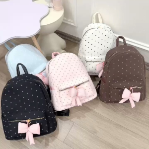 Ba lô nữ ba lô học sinh cấp 1 cấp 2 cấp 3 họa tiết chấm bi kèm nơ hồng ở túi trước phong cách thời trang Hàn Quốc