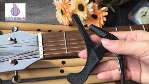 Capo cho đàn guitar kẹp cực chắc - Tặng kèm phím gảy Alice