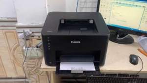 Máy In Văn Phòng ( In 2 Mặt A4A5 Qua Wifi Tốc Độ Cao ) - Canon 151DW ( Tặng Hộp Mực Đa Năng - Dây Nguồn  Cáp in Mới 100% Đi Theo Máy )
