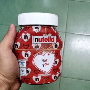 Nutella Hazelnut Chocolate Spread 680gm jar with heart pattern white lid red label "for you" tag