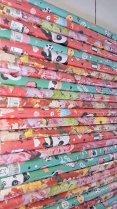 KERTAS KADO MERK KIKI SUDAH DI GULUNG ISI 50 (1 PAK)