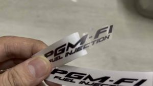 Tem Pgm-fi nền trong dán cho mọi dòng xe (giá 1 cặp)