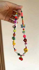 สร้อยคอลูกปัด (ตุ๊กตาน่ารักคละสี) พร้อมจี้เชอร์รี่