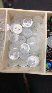 Nút sơmi 2 lỗ học sinh trong link này bạn theo bịt 60 nút hoặc 144 nút