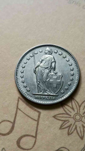 100% Authentic 1968 Helvetica leaves Switzerland one franc old coin good condition   *Actual photo taken not from library photos   *Cataloges #0248   Country: Switzerland  Period: Confoederatio Helvetica  1968 - 2025  Currency: Swiss franc