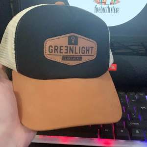 TOPI BASEBALL GREENLIGHT JARING TRUCKER DISTRO