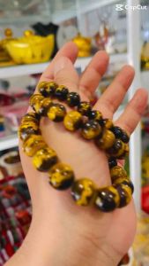 Vòng tay đá M.ắt h.ổ Nâu V.àng khắc R.ồng vàng mang lại Tài Lộc và May Mắn cho Nam Nữ.