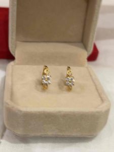 Anting wanita emas muda jepit mata empat 1 gram