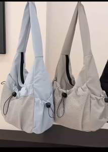 Drawstring style multi compartment nylon material shoulder bag