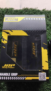 JRP Racing Product Handle Grip with black and yellow design textured surface visible through transparent window QR code on packaging.