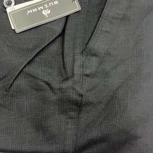 Quần kaki Guzman không xếp ly (regular) ống rộng xuông