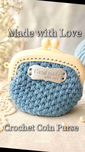 Handmade crochet coin purse with plastic kiss clasp.