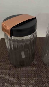 Toples canister kaca bulat ulir Herevin tutup plastik