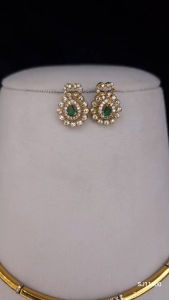 Sg readystock imitation Gold necklace with floral pendant and matching earrings featuring green gemstones. Indian minimalist jewellery