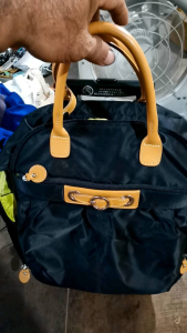 Kanana Project trolley bag. Based on similar models its features often include