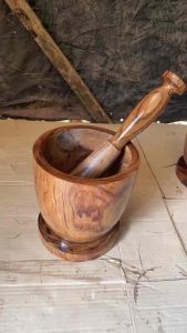 Wooden mortar and pestle set with polished finish and sturdy base 10x13 inches for kitchen use.