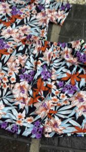 ชูซูเด็ก แขนสั้นขาสั้น ผ้าไมโครนิ่มกับกระดูกแข็ง สีสดสด ลายสงกรานต์ ลายดอก ลิลลี่B