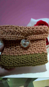 Multi purpose Crochet mini bag for your sanitary pads pad/coins .