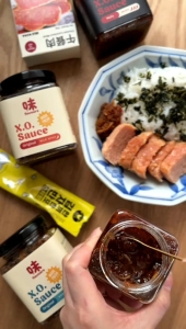 Brand: 味 flavours   | Main product: X.O. Sauce   | Key attributes: Original Non-Spicy Made Fresh   | Fit/use: All-purpose condiment   | Scene: On wooden surface with natural light
