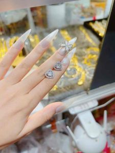 Bông tai tim mini đá tấm viền xi bạch kim Kami trang sức sỉ