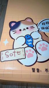 Soft Squishy Stress Relief Toy with Cat Face and Pom Poms