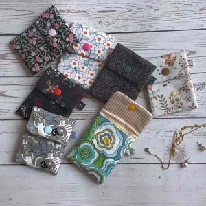 Handmade credit card / notes /ezlink holder with a charm and key ring