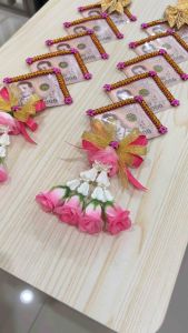 สีชมพู มาลัยใส่แบงค์ พวงมาลัยคล้องคอนาค พวงมาลัยบ่าวสาว พวงมาลัยประดิษฐ์