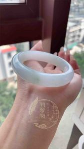 Light Coloured Floating Flowers Jadeite Bangle (晴底飘绿翡翠手镯）
