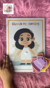 busy book choosing girl clothes shadow making